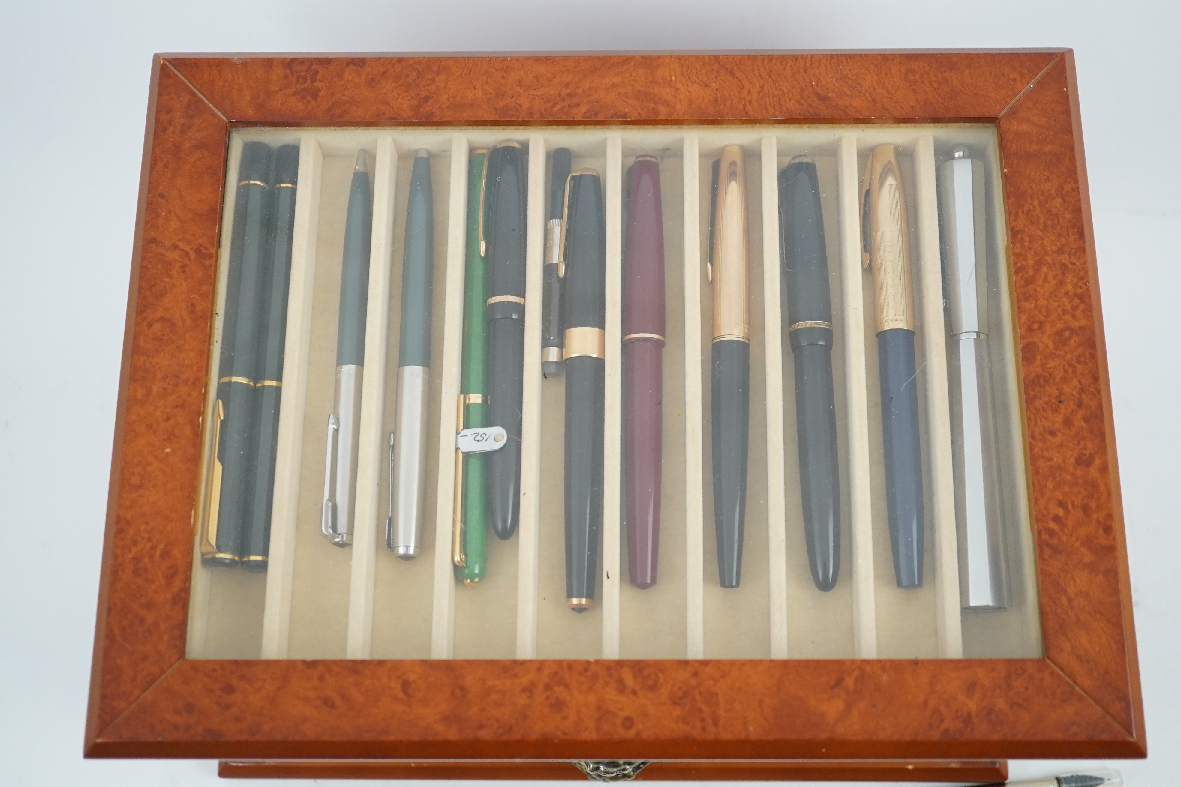 A large quantity of pens etc. and collector's cabinet